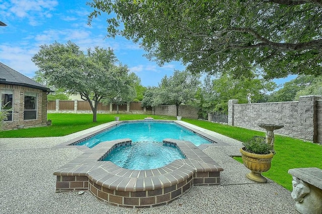 view of swimming pool with a fenced backyard, a fenced in pool, and a lawn