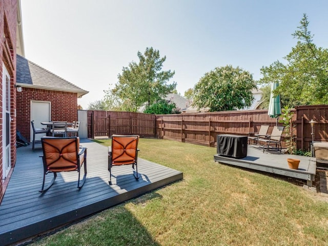 view of yard featuring a deck