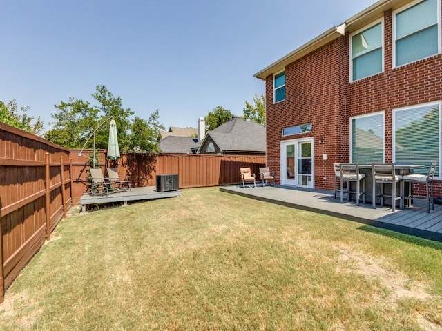 view of yard with a wooden deck