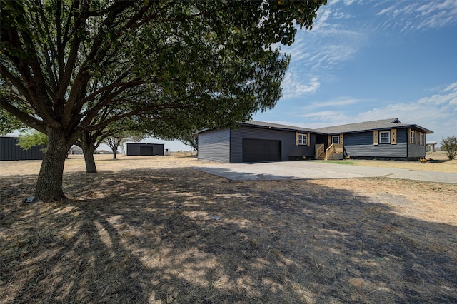 ranch-style home with a garage