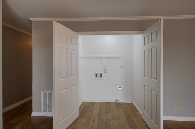 laundry room featuring hardwood / wood-style floors, ornamental molding, and washer hookup