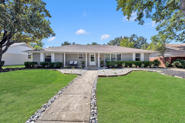 ranch-style home featuring a front yard