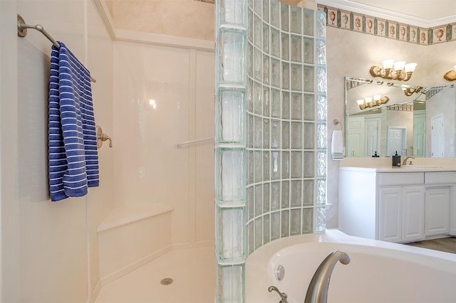 bathroom with independent shower and bath, vanity, and crown molding