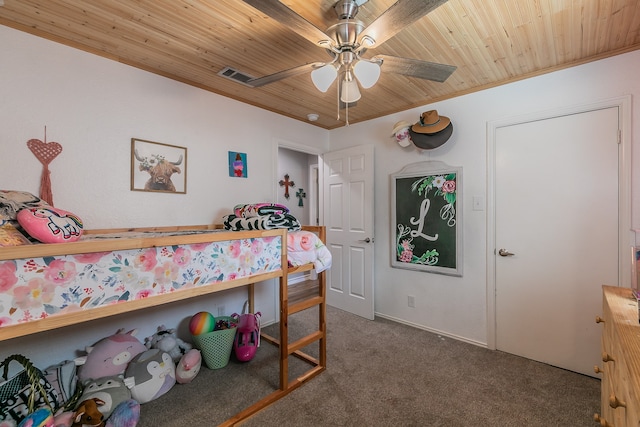 carpeted bedroom with ceiling fan and wood ceiling