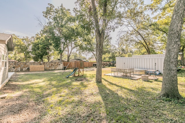 view of yard with a playground