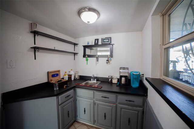 bar with dark tile patterned flooring