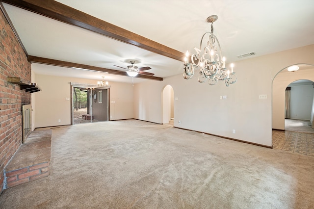 unfurnished living room featuring beamed ceiling, brick wall, ceiling fan with notable chandelier, and light colored carpet