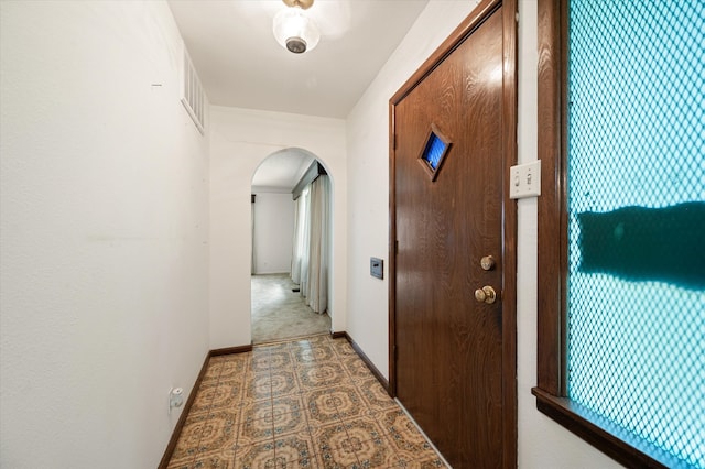 hallway with carpet flooring