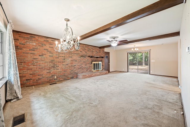 unfurnished living room with brick wall, carpet floors, beamed ceiling, a fireplace, and ceiling fan with notable chandelier