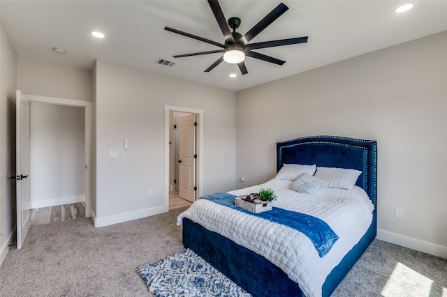 carpeted bedroom featuring ceiling fan