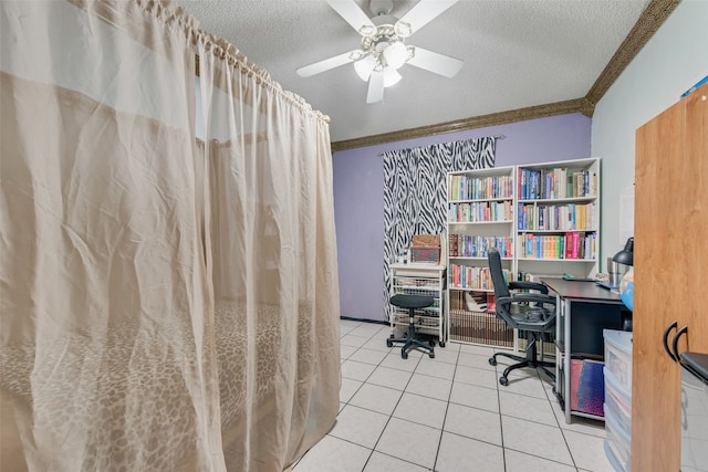 tiled office space with ceiling fan, a textured ceiling, and crown molding