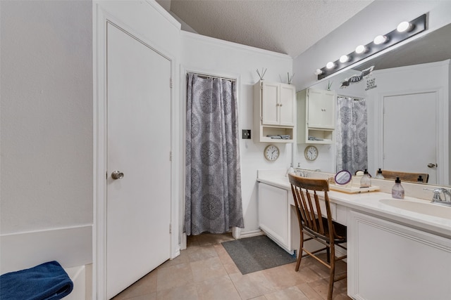 bathroom with tile patterned floors, a textured ceiling, vanity, crown molding, and a shower with curtain