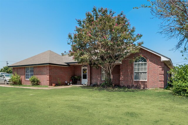 201 Anita Ln, Waxahachie, TX 75165 - ranch-style house with a front yard and brick siding