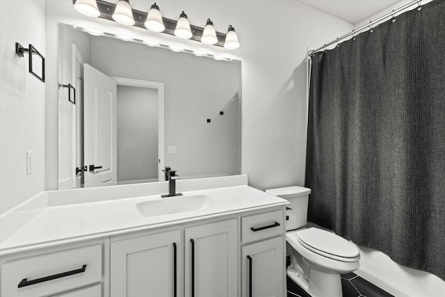 full bathroom with shower / bath combination with curtain, vanity, and toilet