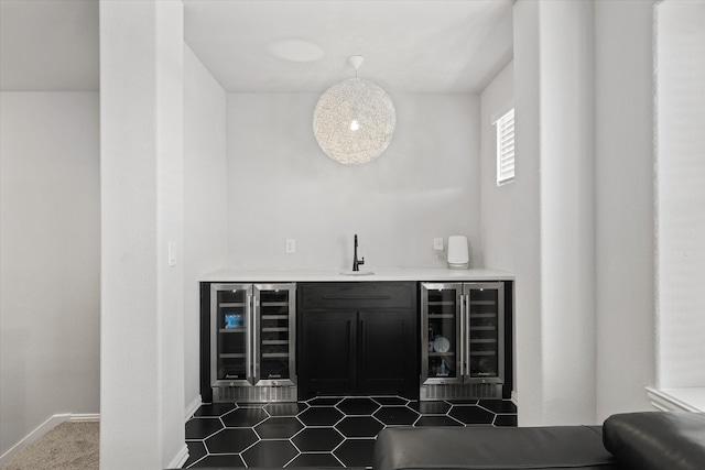 bar featuring sink and wine cooler