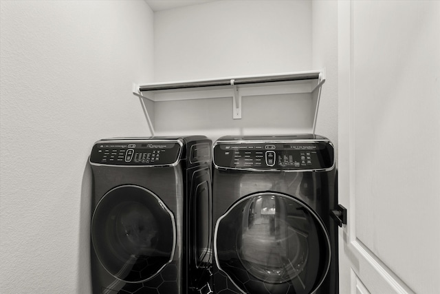 laundry room with washer and dryer