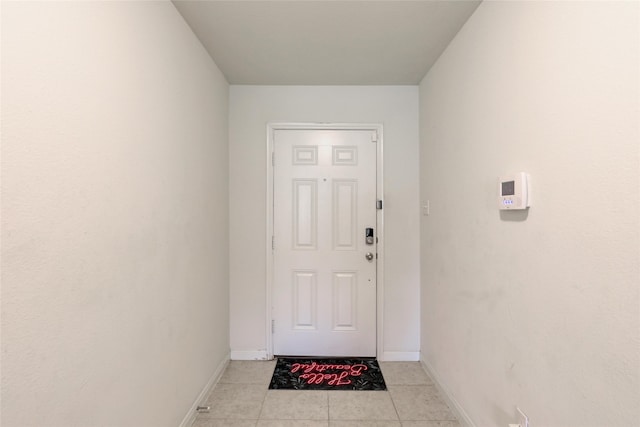 entryway featuring light tile patterned flooring