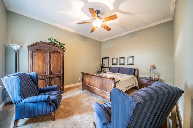 carpeted bedroom with ceiling fan and crown molding