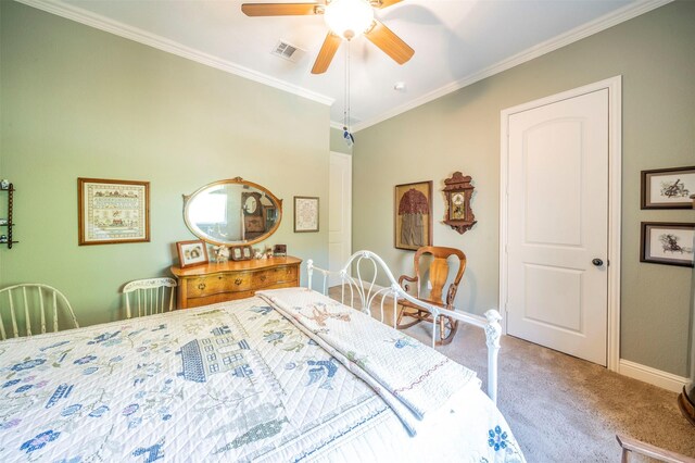 bedroom featuring ceiling fan, carpet, and crown molding