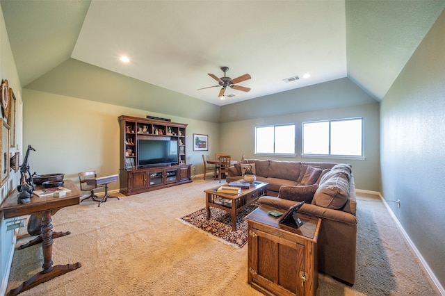 living room featuring carpet floors and ceiling fan