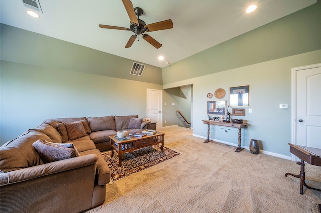 carpeted living room featuring ceiling fan