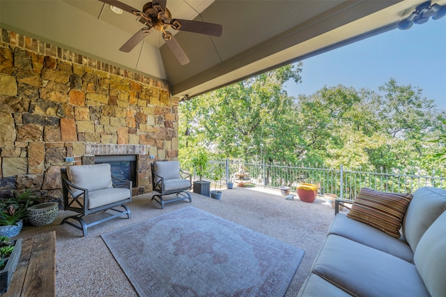 view of patio / terrace featuring ceiling fan and an outdoor living space