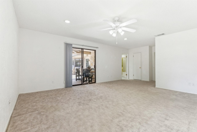 unfurnished room featuring carpet, visible vents, ceiling fan, and recessed lighting