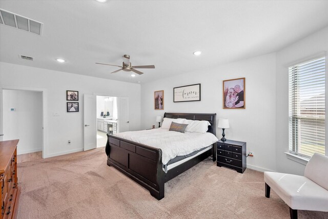 carpeted bedroom featuring ceiling fan