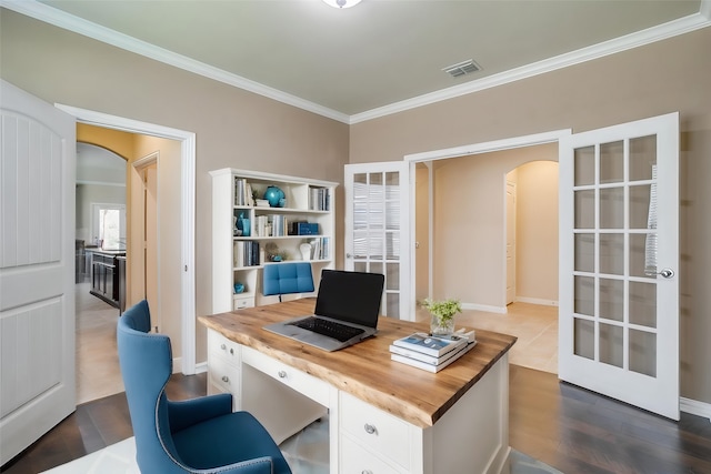 office area with dark hardwood / wood-style floors and ornamental molding