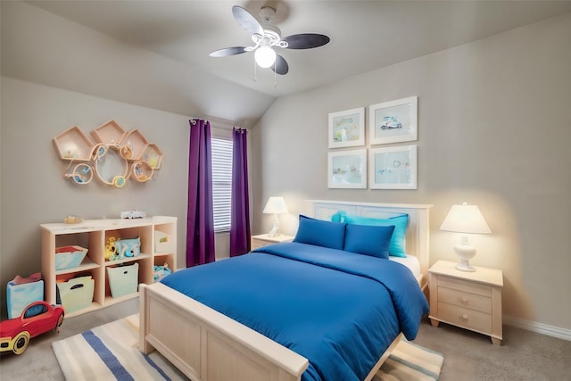 bedroom featuring ceiling fan, vaulted ceiling, and light carpet