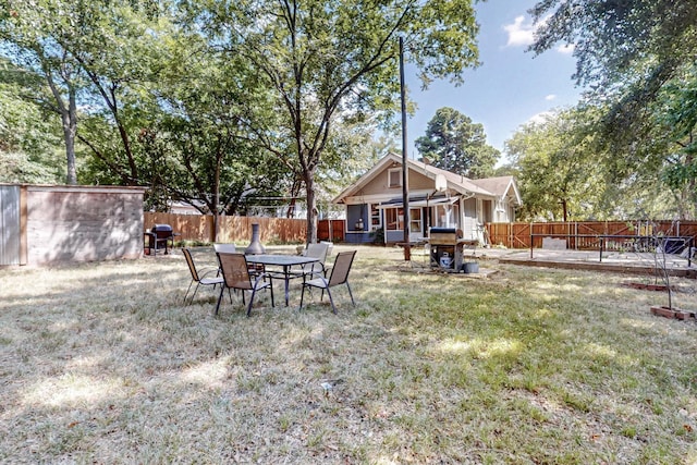 view of yard with a patio area and a fenced backyard