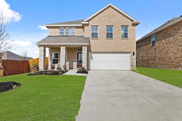 view of front facade featuring a garage and a front yard