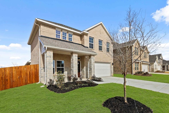 view of front of house with a garage, covered porch, and a front lawn