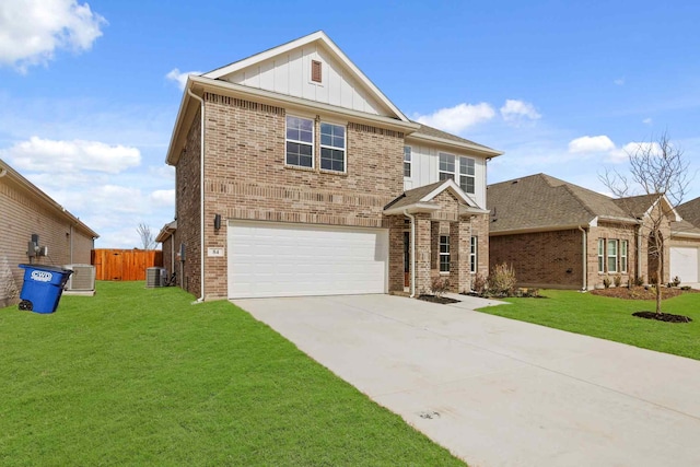 view of front of house with a garage, a front yard, and central air condition unit