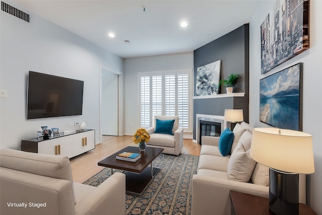 living room with hardwood / wood-style flooring