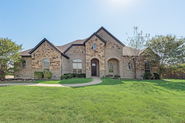 view of front facade with a front lawn