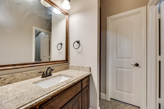 bathroom with vanity and tile patterned floors