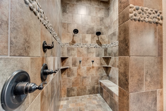 details featuring tiled shower