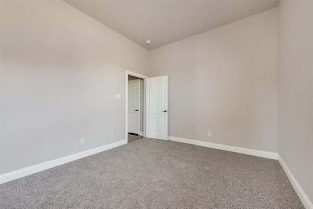 unfurnished room with carpet floors