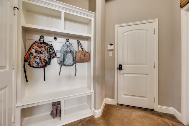 mudroom featuring concrete floors