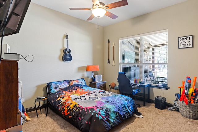 bedroom featuring ceiling fan and carpet floors