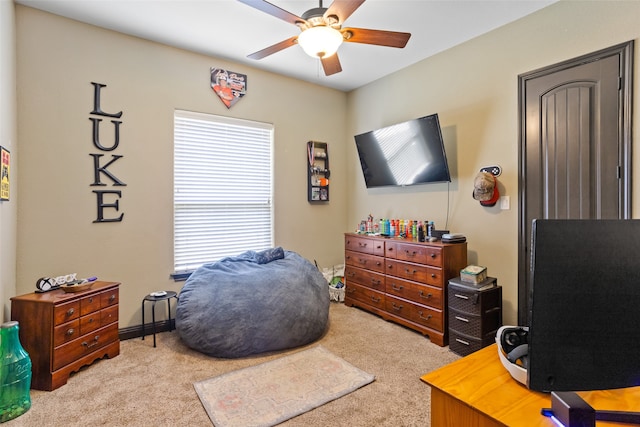 carpeted bedroom with ceiling fan