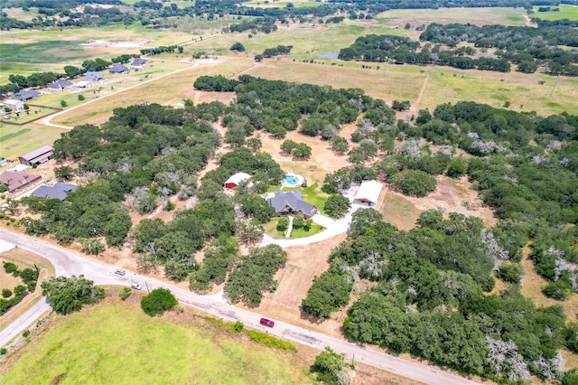 birds eye view of property featuring a rural view