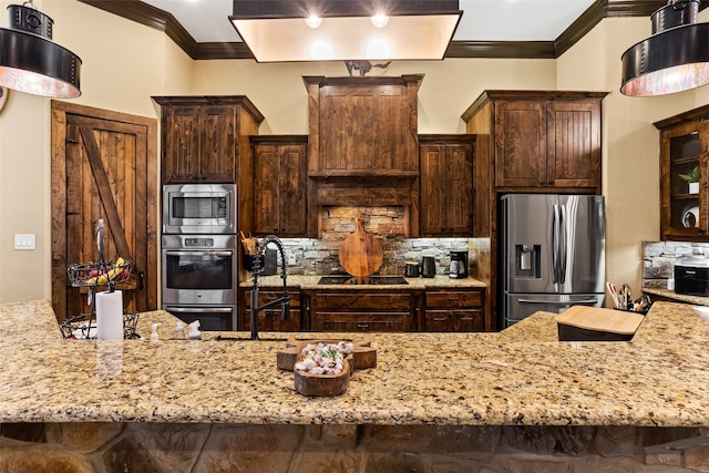 kitchen with backsplash, stainless steel appliances, ornamental molding, dark brown cabinets, and light stone countertops