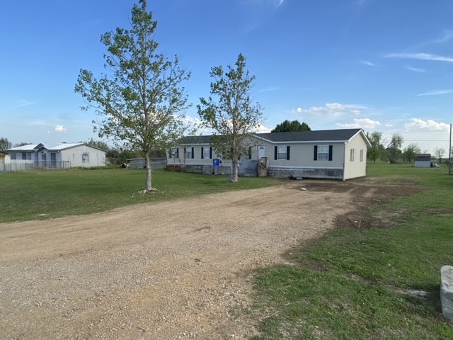 view of front of house featuring a front yard