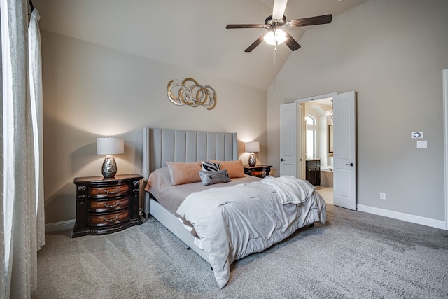 bedroom featuring ceiling fan, carpet floors, ensuite bathroom, and high vaulted ceiling