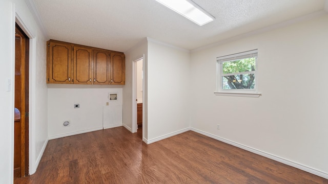 laundry room with dark wood-style floors, washer hookup, cabinet space, electric dryer hookup, and baseboards