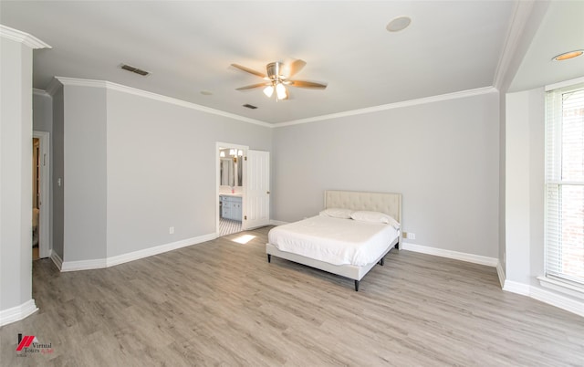 bedroom with light wood finished floors, baseboards, visible vents, and ornamental molding