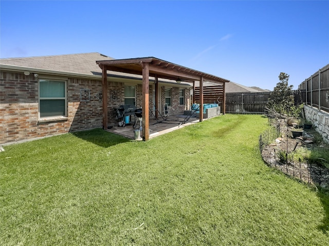 view of yard with a patio, outdoor lounge area, and a fenced backyard