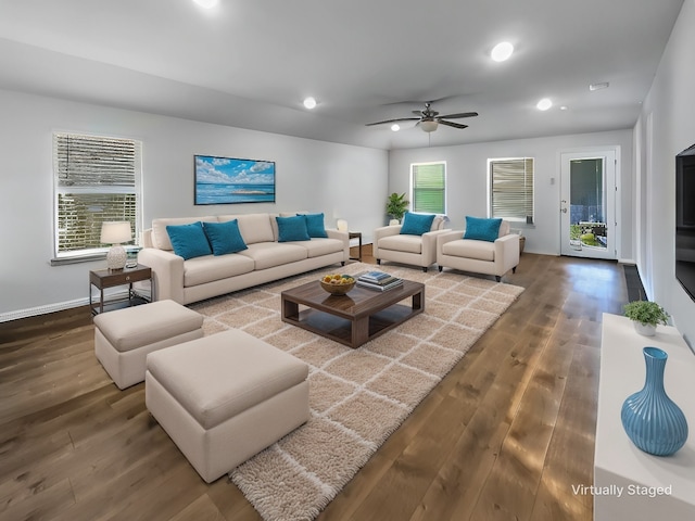 living room with recessed lighting, dark wood-style flooring, ceiling fan, and baseboards